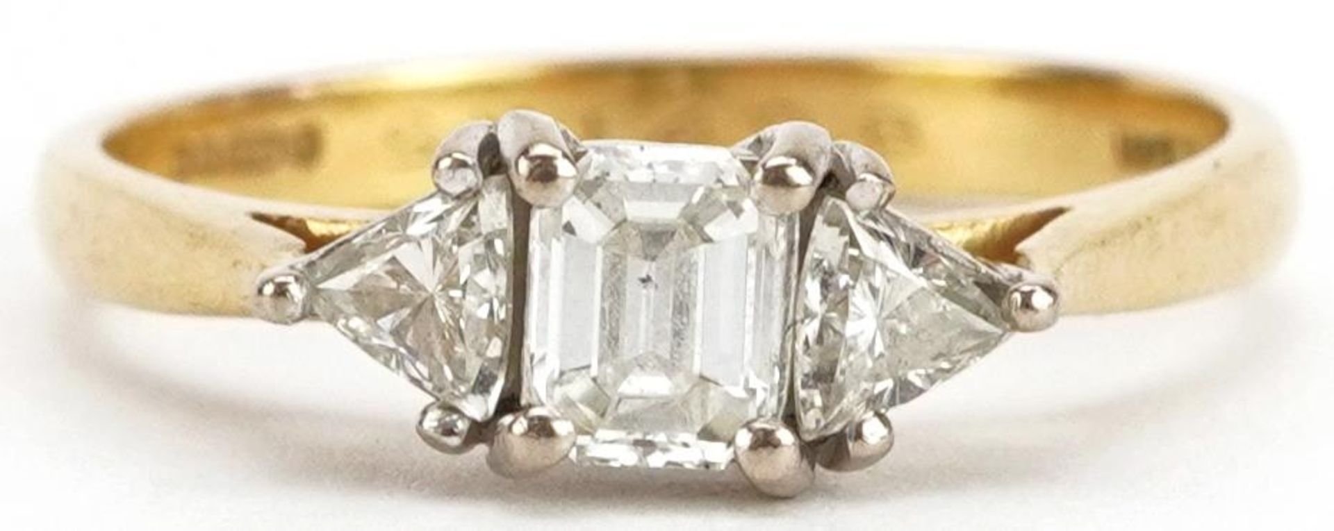 18ct gold diamond three stone ring, total diamond weight approximately 0.68 carat, the central