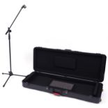 Gator Cases musical instrument flight case with microphone stand, the case 140cm in length : For