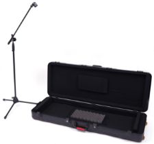 Gator Cases musical instrument flight case with microphone stand, the case 140cm in length : For