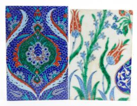 Pair of Turkish Iznik pottery tiles hand painted with flowers, the largest 24cm x 16cm : For further