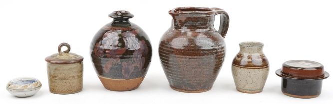 Studio pottery including large jug, pots and covers and vases, various impressed marks, the