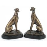 After Barrie, pair of bronzed studies of seated greyhounds, 18.5cm high : For further information on