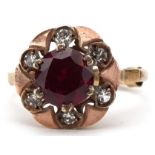 9ct gold ruby and white spinel cluster ring, the ruby approximately 8.10mm x 4.90mm deep, size P,