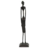 Indian bronze figure of a tribesman, 30.5cm high : For further information on this lot please