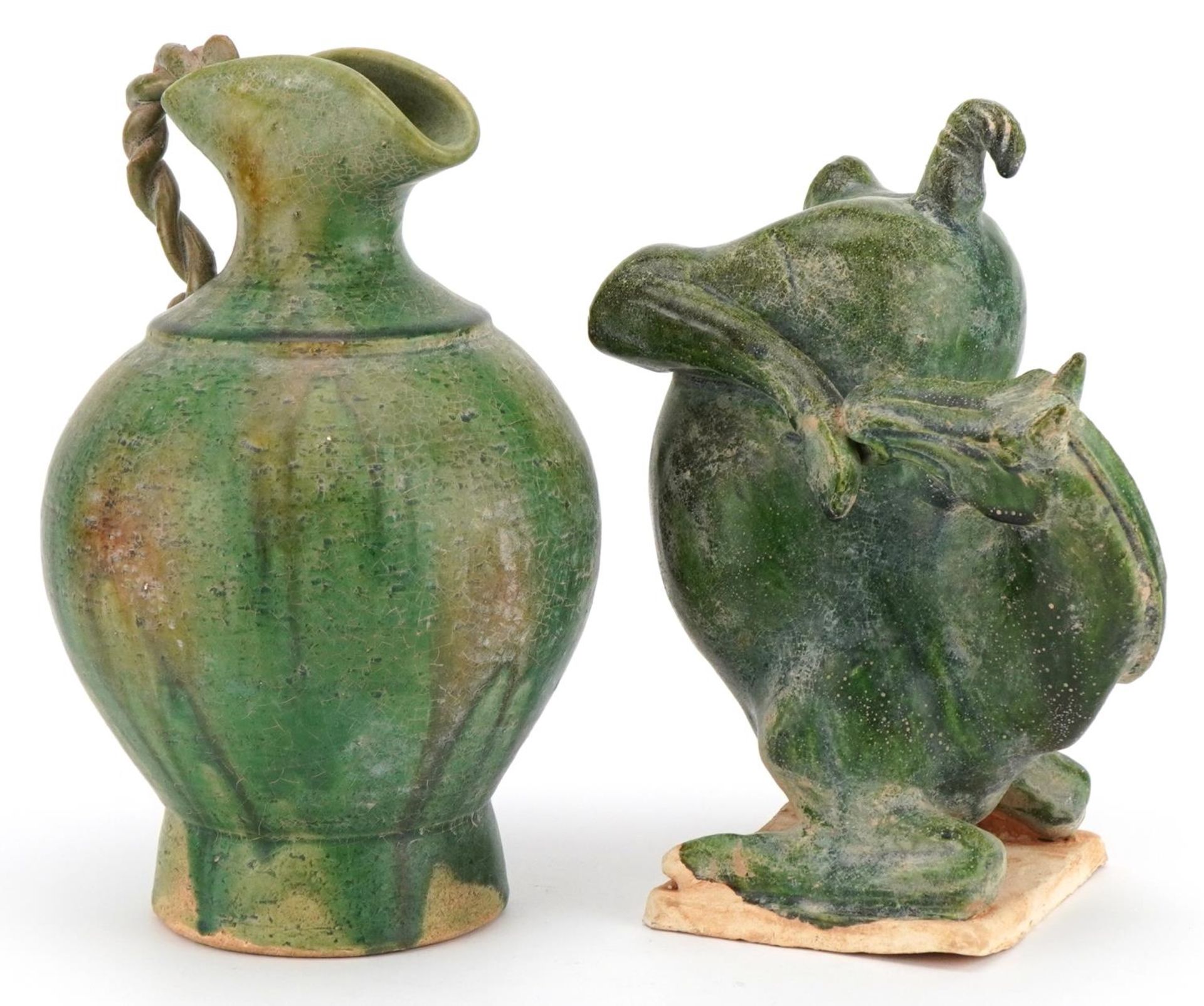 Chinese archaic style horse and a similar spouted vessel, each having green glazes, the largest 22.