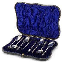 William Hutton & Sons Ltd, set of six Edwardian silver apostle teaspoons and sugar tongs housed in a