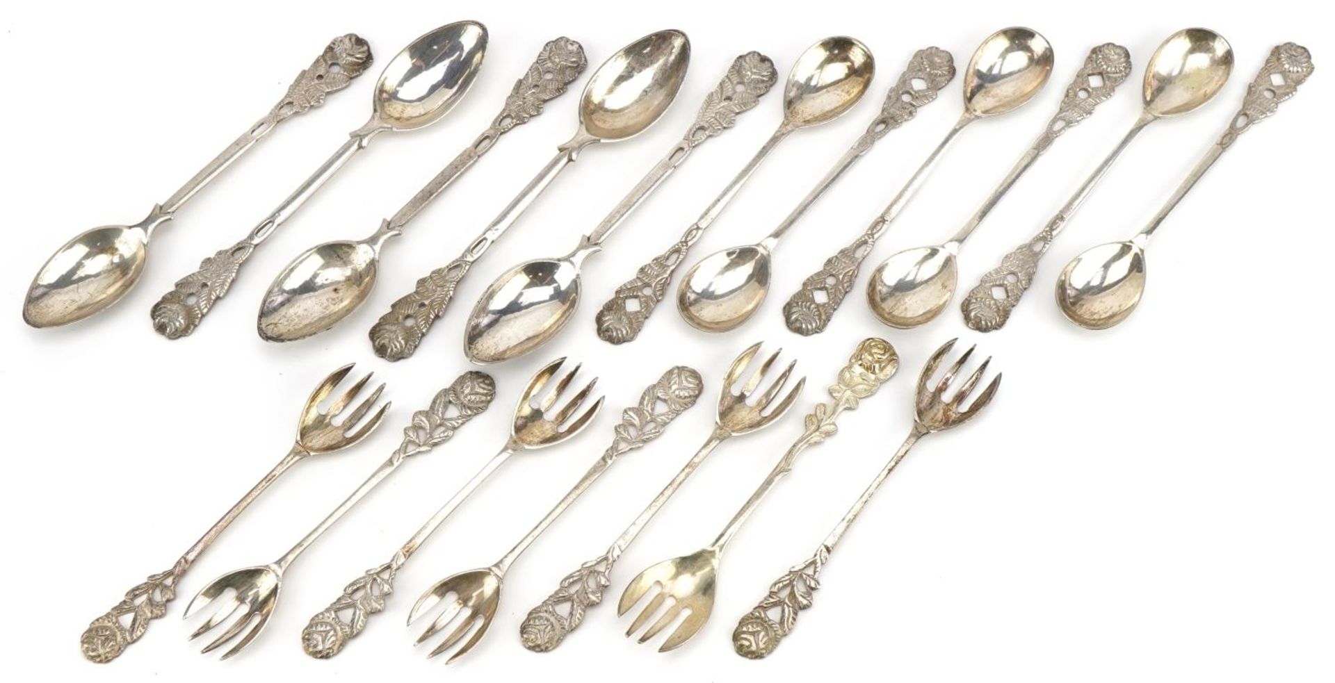 Eighteen 800 grade silver forks and spoons with naturalistic terminals, 12.5cm in length, 290.0g :