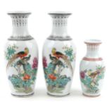 Three Chinese porcelain baluster vases including a pair, each hand painted with birds amongst