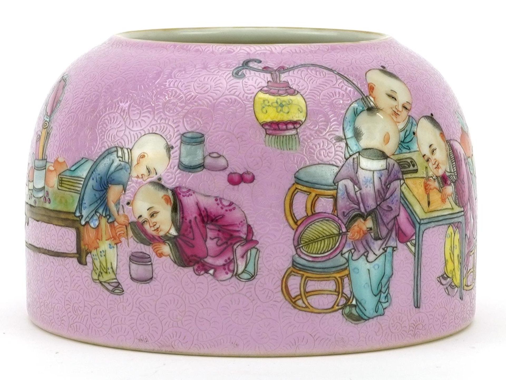 Chinese porcelain beehive water pot having a pink glaze hand painted with children playing, six