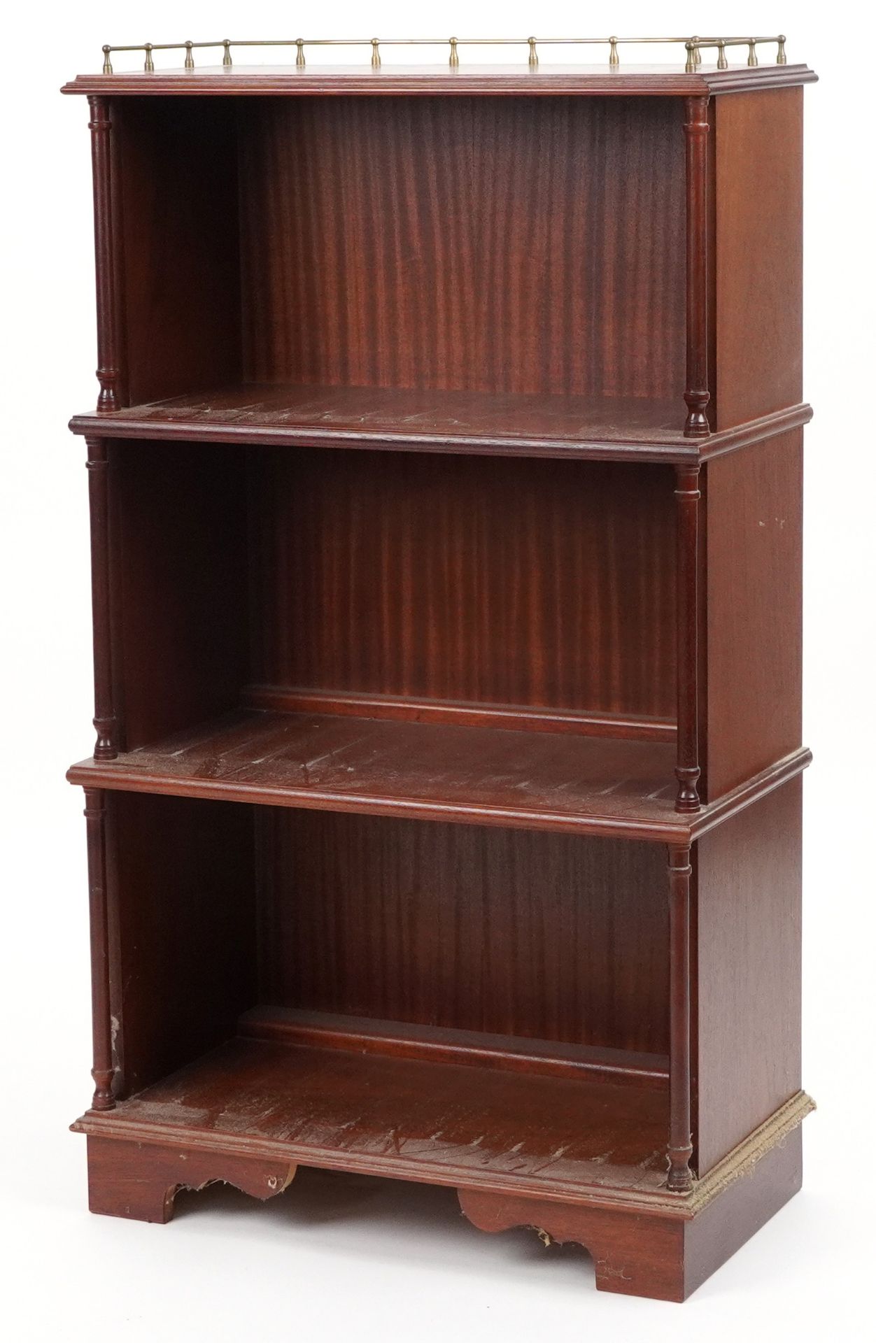Mahogany four tier waterfall bookcase with brass gallery, 113cm H x 65cm W x 34cm D : For further