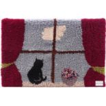 Rectangular woolwork panel worked with a cat beside a window made by Reg Godling and Ron Tingay,