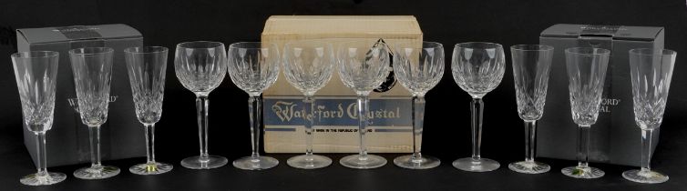 Set of six Waterford Crystal Colleen hock glasses and a set of four Lismore Champagne flutes with