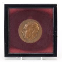 Robert Soupault commemorative bronze medallion housed in a glazed frame, dated 1968 and Antony