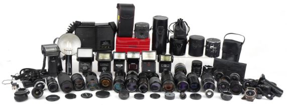 Collection of vintage and later camera lenses and accessories including Sigma, Olympus and Canon :