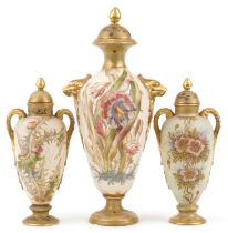 Royal Bonn, garniture of three blush ivory vases and covers with handles, each decorated with