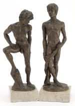 Neil Godfrey 1988, pair of contemporary cold cast bronze figures of standing nude males raised on