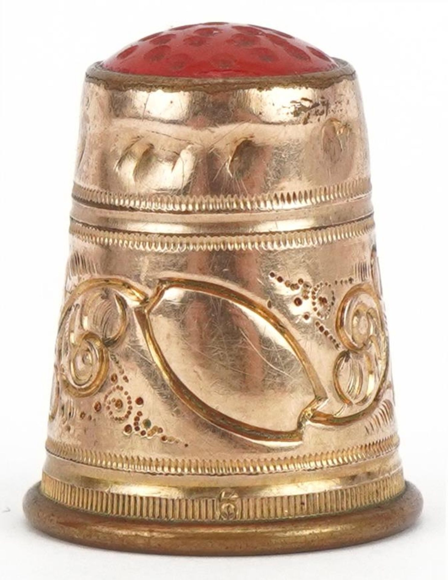 Yellow metal thimble with hardstone top, 2cm high, 3.7g : For further information on this lot please