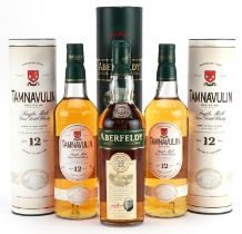 Three bottles of whisky with boxes comprising two bottles of Tamnavulin aged 12 Years and