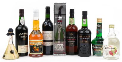Nine bottles of alcohol including Cockburn's port, Bordeaux claret red wine and Leacock's