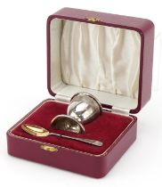 Henry Clifford Davis, Elizabeth II silver christening eggcup and spoon with fitted case,