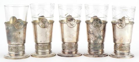 Five French hunting interest cut glasses with silver plated holders cast with animal heads, each