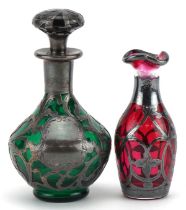 Silver overlaid ruby glass vase and a silver overlaid green glass scent bottle, the largest 11cm