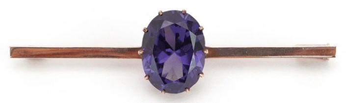 Unmarked gold alexandrite solitaire bar brooch, the stone approximately 14.3mm x 11.5mm x 7.0mm deep