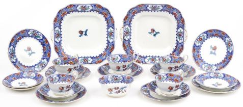 Aynsley teaware decorated with flowers including trios and two sandwich plates, the largest each