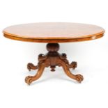 Victorian burr walnut loo table with quarter veneered top and floral carved knees and feet, 74cm H x