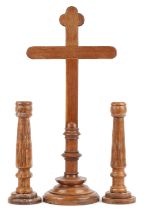 Carved oak altar cross and pair of turned candlesticks, the largest 77cm high : For further