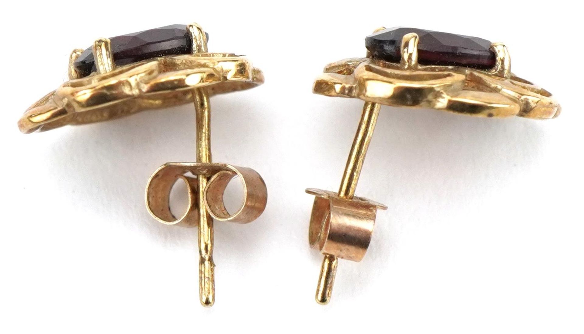 Pair of 9ct gold garnet openwork stud earrings, 1.1cm high, 1.1g : For further information on this - Image 2 of 2