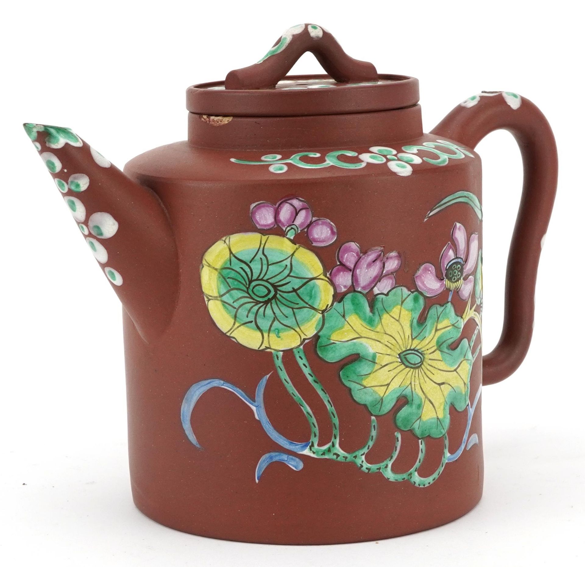 Chinese Yixing terracotta teapot enamelled with flowers, incised character marks to the base, 18.5cm
