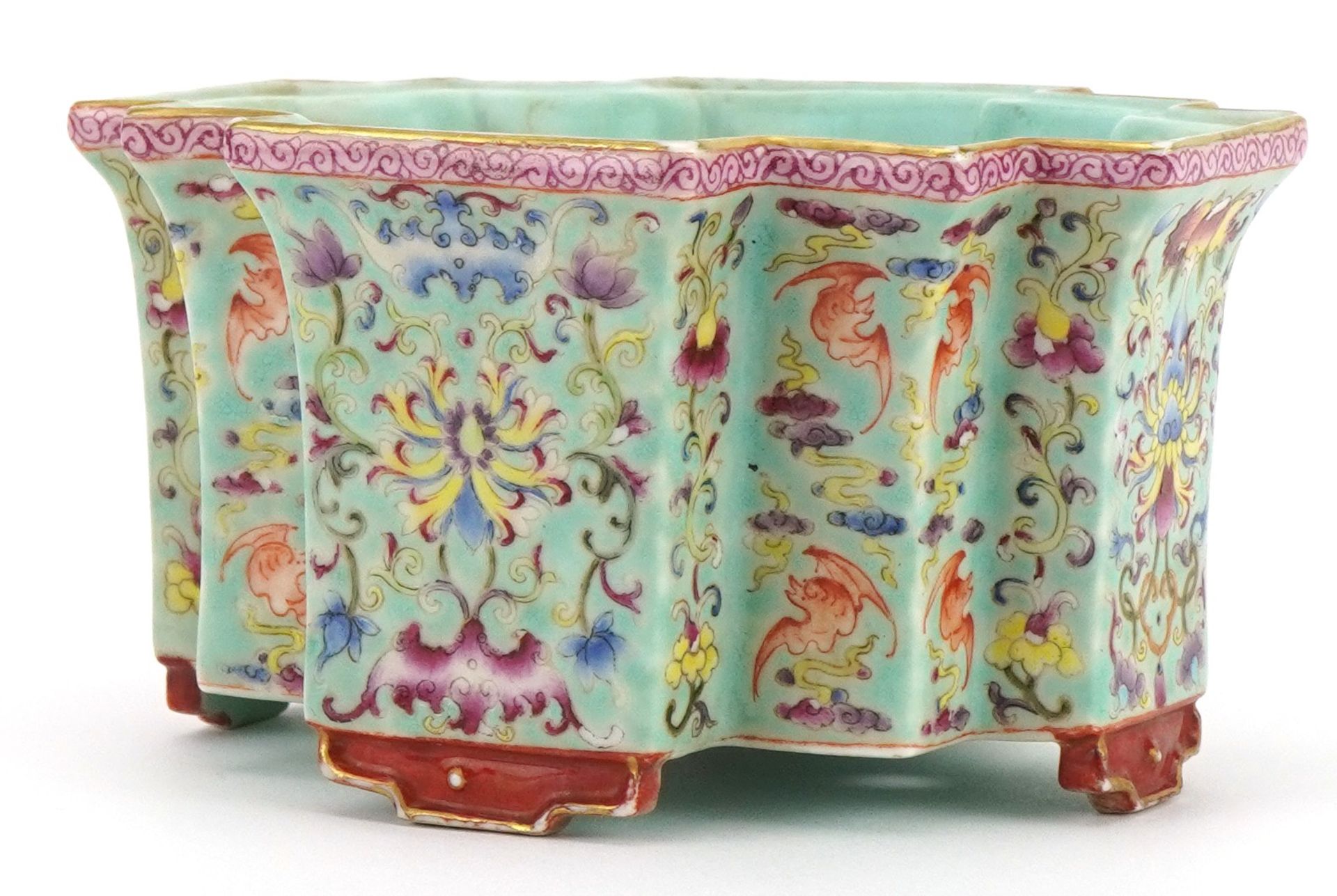 Chinese porcelain four footed planter having a turquoise glaze hand painted in the famille rose