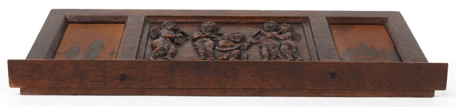 Early 20th century oak letter rack carved with Putti musicians, 46cm wide : For further - Image 5 of 5