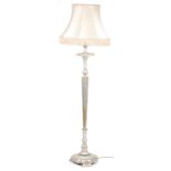 Classical silver gesso tapering standard lamp with silk lined shade, 181cm high : For further