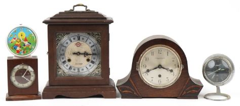 Five early 20th century and later clocks including Smiths Noddy design alarm clock and a Clover 31