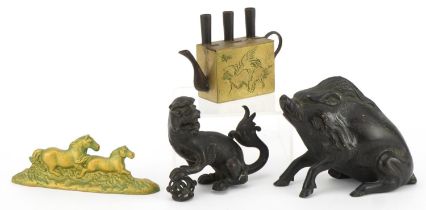 Chinese metalware including a patinated bronze Foo dog and brass teapot, the largest 13cm in