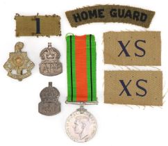 British militaria including World War II Defence medal, silver ARP pin badge, silver ARP lapel,
