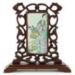 Chinese porcelain panel hand painted with a female housed in a carved hardwood stand, 20.5cm