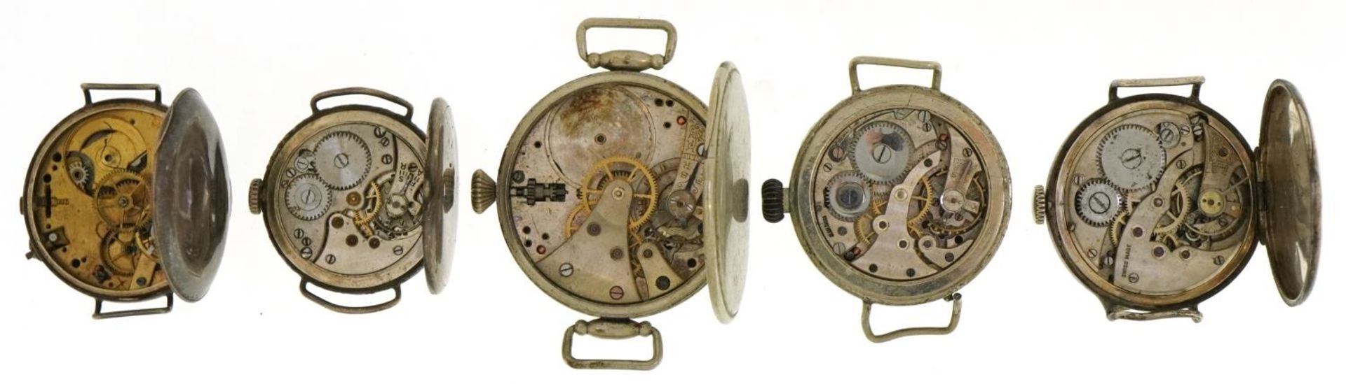 Five military interest trench style wristwatches, two silver, one engraved 24716 R, the largest 37mm - Image 3 of 5