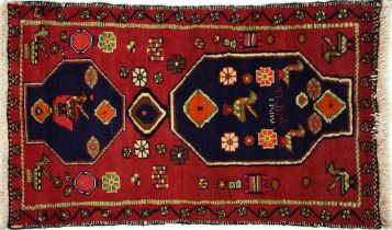 Rectangular Persian rug decorated with wild animals and flower heads, 119cm x 68cm : For further