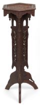 Anglo Indian plant stand profusely carved with flowers and foliage, 100cm high : For further