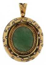 18ct gold hand carved emerald and diamond pendant, total emerald weight approximately 22 carat, 4.
