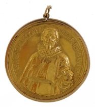 Antique yellow metal Italian plastic reconstruction medal housed in an unmarked gold pendant