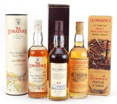 Three bottles of whisky with boxes comprising Aultmore aged 12 years, Edradour aged 10 years and