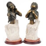 After Andre Paor, pair of cold cast bronzed figures of young females with simulated naturalistic