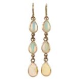 Pair of unmarked gold opal teardrop earrings, tests as 9ct gold, 3.5cm high, 1.0g : For further