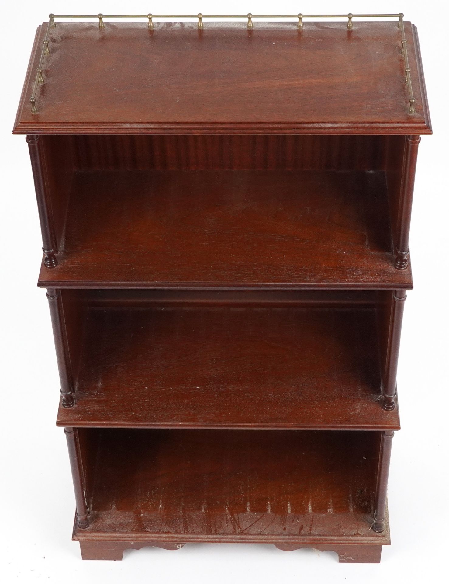 Mahogany four tier waterfall bookcase with brass gallery, 113cm H x 65cm W x 34cm D : For further - Image 3 of 4