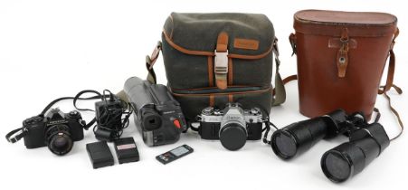 Cameras and binoculars including a pair of Dollond Owlvis 15 x 60, Canon AE1 and Pentax NV : For