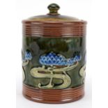 Royal Doulton, Art Nouveau stoneware tobacco jar and cover hand painted with stylised flowers,